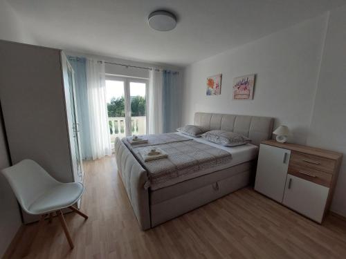 Apartments with parking space Mundanije, Rab - 4953