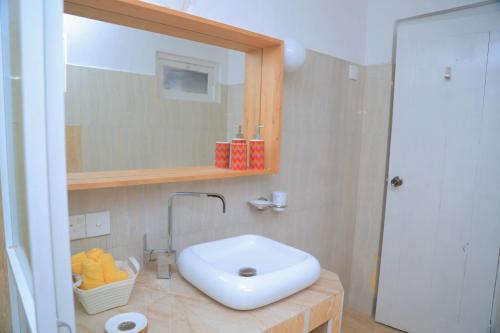 Et badeværelse på Destine Holiday Bungalow