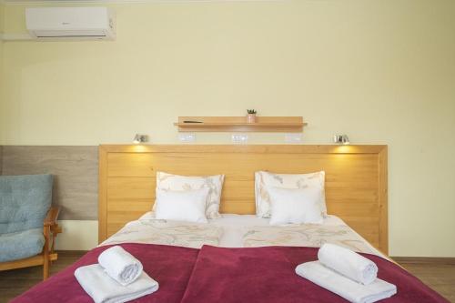 Letto o letti in una camera di Ács Apartman