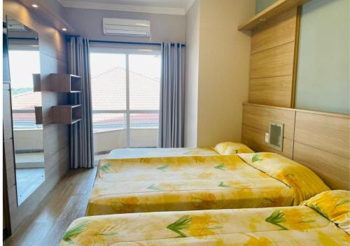 Dona Adelia Hotel e Restauranteにあるベッド