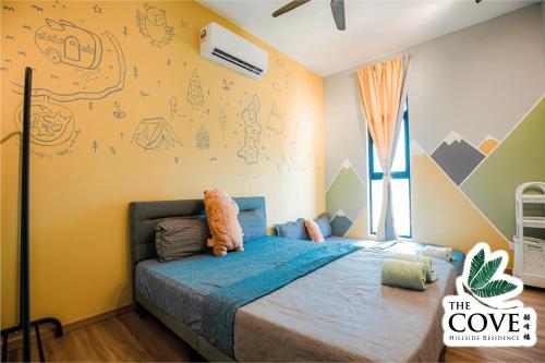 a childs bedroom with a bed in a room at Ipoh Tambun Waterpark Apartment The Cove Hillside in Ipoh