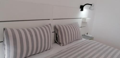 Letto o letti in una camera di Los Geranios n.25