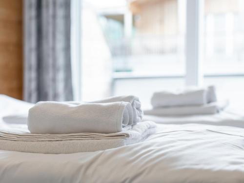 Una cama o camas en una habitación de Apart33 Top 1-19