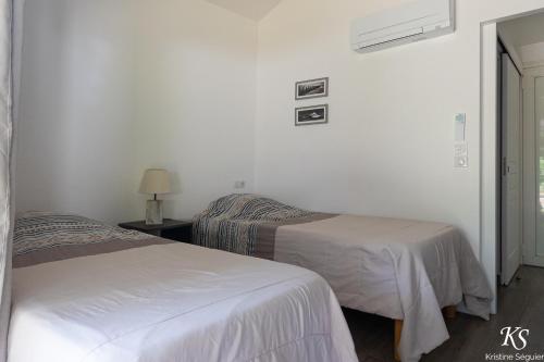 Ein Bett oder Betten in einem Zimmer der Unterkunft Jaray-Jaclo Chambres d' hôtes