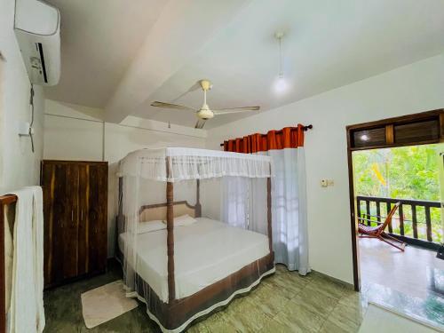 Postel nebo postele na pokoji v ubytování Lake View Villa - Tangalle