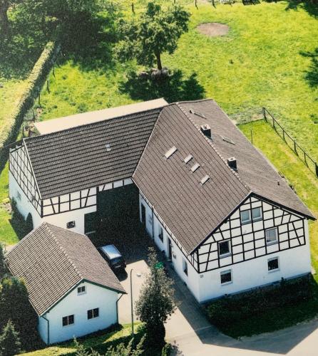 an overhead view of a house with a roof at Ferienwohnung Eifel-Life in Simmerath