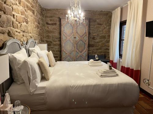 Ένα ή περισσότερα κρεβάτια σε δωμάτιο στο The Manor House