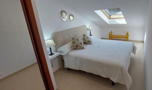 Ένα ή περισσότερα κρεβάτια σε δωμάτιο στο Apartamento Alefriz