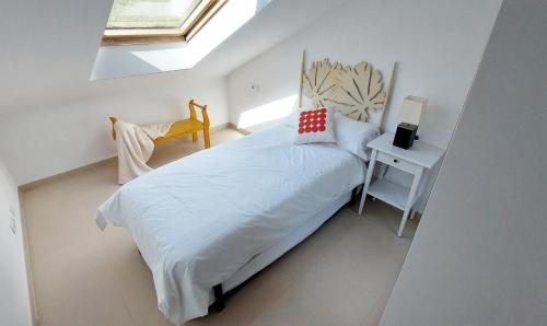 Ένα ή περισσότερα κρεβάτια σε δωμάτιο στο Apartamento Alefriz