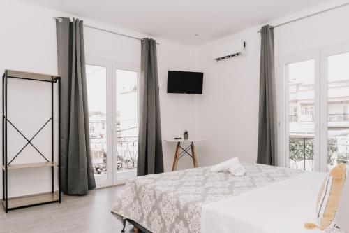 Postel nebo postele na pokoji v ubytování Sea Sailing Apartments