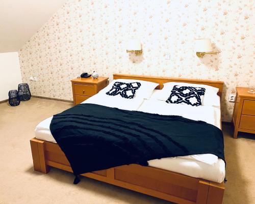 Postel nebo postele na pokoji v ubytování Hotel Pošta
