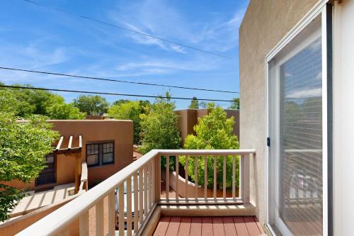 a balcony with a view of a building at Susan's Hideaway Unit B in Santa Fe