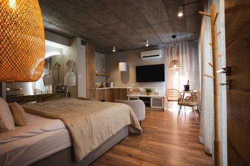 Postel nebo postele na pokoji v ubytování M2 Resort Wellness & Spa