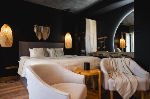 Postel nebo postele na pokoji v ubytování M2 Resort Wellness & Spa