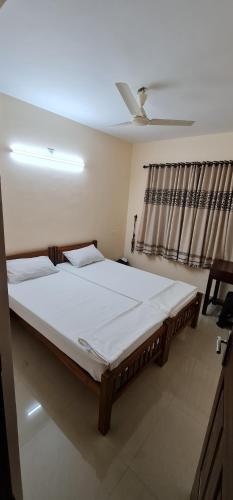 Katil atau katil-katil dalam bilik di Greenfield Suites 1