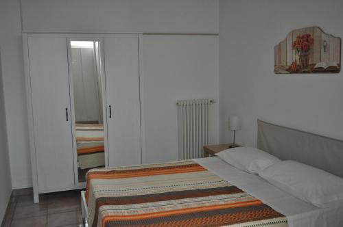 Postel nebo postele na pokoji v ubytování La Specchia