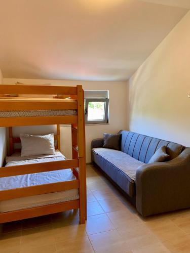 Llit o llits en una habitació de Apartment Victor