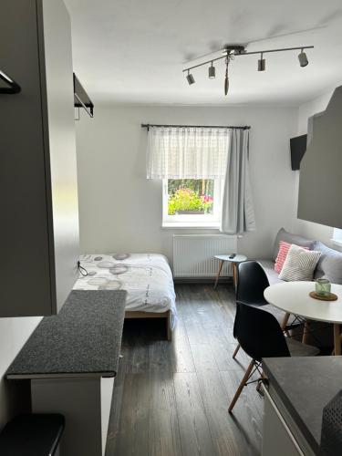 Postel nebo postele na pokoji v ubytování Apartmány u Kuželky