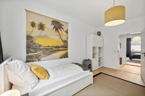 Ένα ή περισσότερα κρεβάτια σε δωμάτιο στο Schicke grosse Wohnung Apartment Wuppertal Ronsdorf- Nähe DUS & Dortmund & Köln & Essen