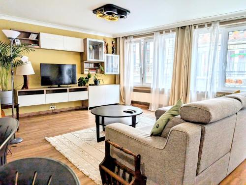 Χώρος καθιστικού στο Superbe appartement dans le centre de Mons - Arivée autonome