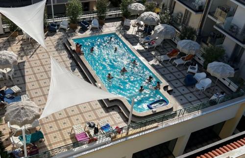 an overhead view of a swimming pool on a building at Hotel Costa Verde in Pineto