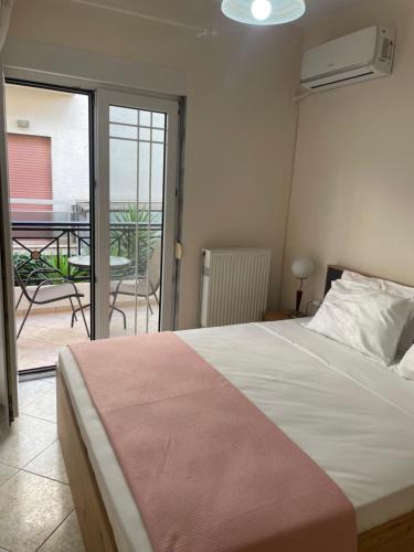Ένα ή περισσότερα κρεβάτια σε δωμάτιο στο Eva's Apartment 2 BDR
