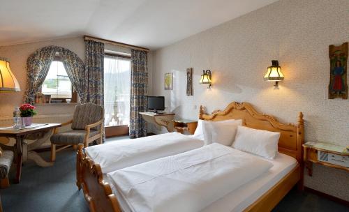 Posteľ alebo postele v izbe v ubytovaní Alpenappartement Europa