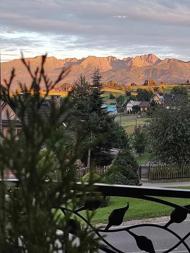a view of a town with mountains in the background at B&R Pokoje Gościnne in Ząb