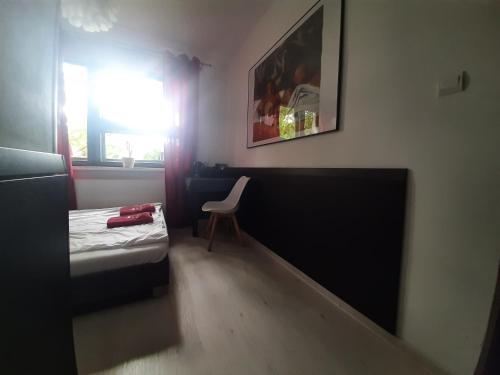 Postel nebo postele na pokoji v ubytování WILLA HONO LULU