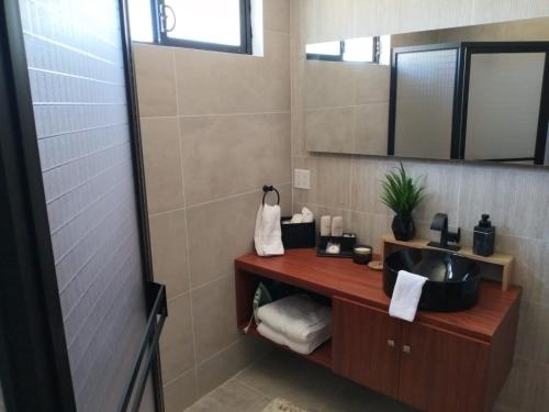 Ένα μπάνιο στο Quinta Lorame Departamento Cabernet