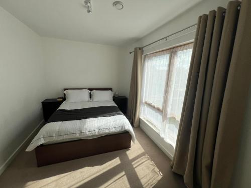 Postel nebo postele na pokoji v ubytování comfortable house