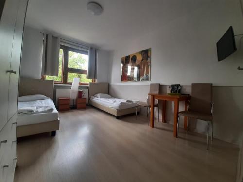 Postel nebo postele na pokoji v ubytování WILLA HONO LULU