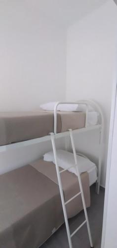 Katil atau katil-katil dalam bilik di B&b Regina Elena - Calabria