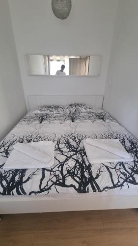 Postel nebo postele na pokoji v ubytování Tuana