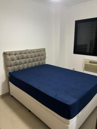 Postel nebo postele na pokoji v ubytování Praia Grande