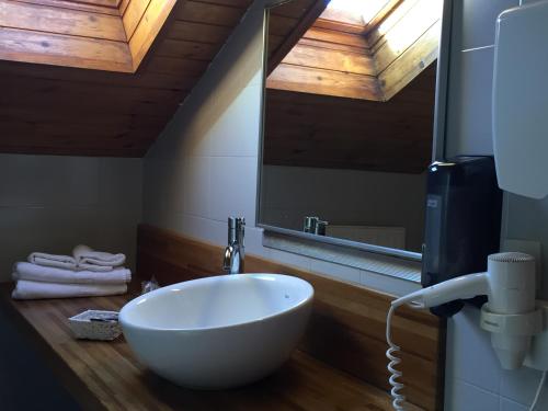 Ванна кімната в Hotel Esquirol