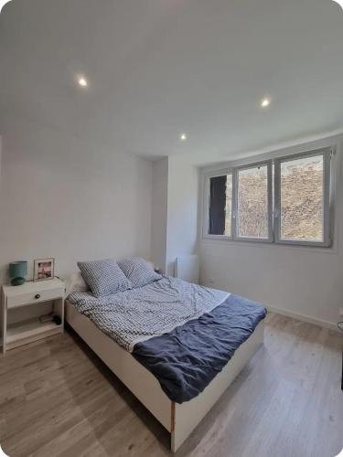 Ένα ή περισσότερα κρεβάτια σε δωμάτιο στο Gustave House