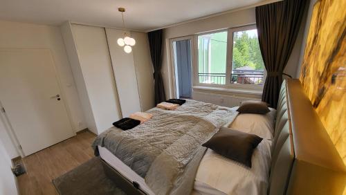 Katil atau katil-katil dalam bilik di Apartmán Adela - AD Nezábudka,Tatranská Štrba