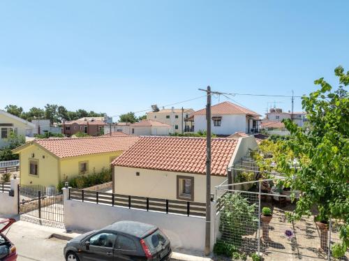 a car parked in front of a house at Kosmas Villas in Skala Kefalonias