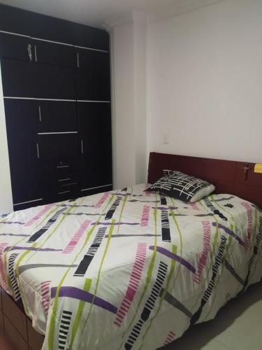 Ένα ή περισσότερα κρεβάτια σε δωμάτιο στο Apartamento primavera