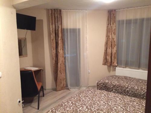 Katil atau katil-katil dalam bilik di Advel Guest Hous