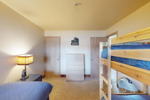 a bedroom with two bunk beds and a bed at Watch Hill Condos Unit 614 in Silverthorne