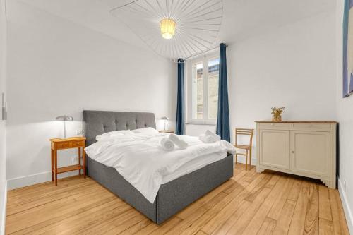 Katil atau katil-katil dalam bilik di Grand Appartement Lumineux - Parking Privé - Clim