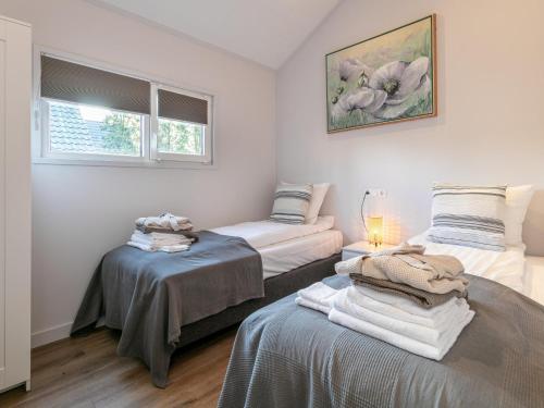 Postel nebo postele na pokoji v ubytování Abs Blokhut