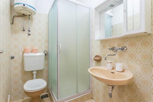 Koupelna v ubytování Apartments and rooms with parking space Supetar, Brac - 5658
