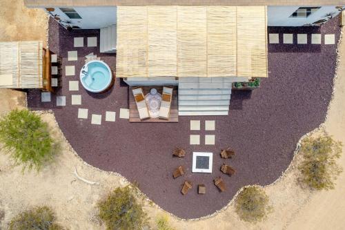 an overhead view of a patio with a building at Desert Moon - Serene Desert Views & Design home in Joshua Tree