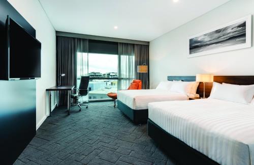 Postel nebo postele na pokoji v ubytování Vibe Hotel Subiaco Perth
