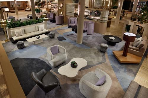 an overhead view of a lobby with chairs and tables at The Westin DC Downtown in Washington, D.C.