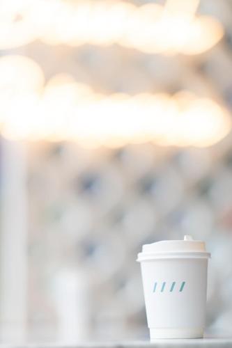 a cup of coffee on a table at The Verandah - SHA Extra Plus in Ao Nang Beach