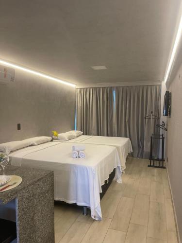 Katil atau katil-katil dalam bilik di Blue Sunset Flats Beira Mar - Apt 217